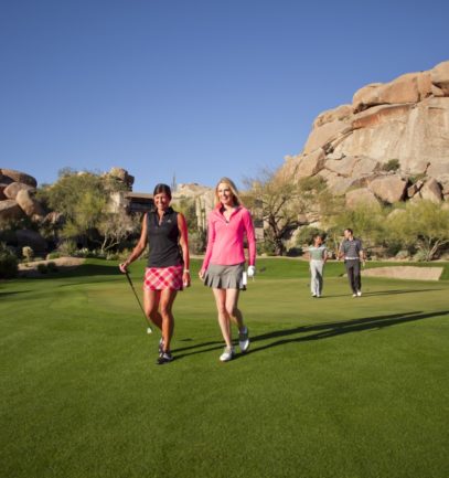 Two women walking on Boulder's golf course