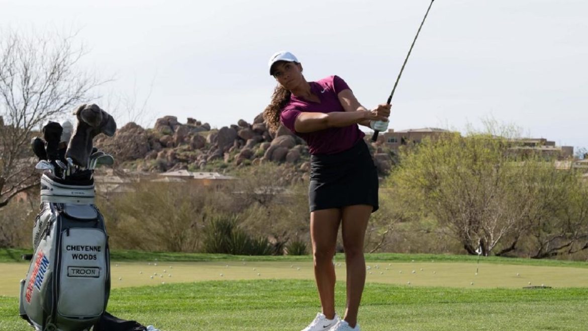 Golfer Cheyenne Woods hitting a golf ball