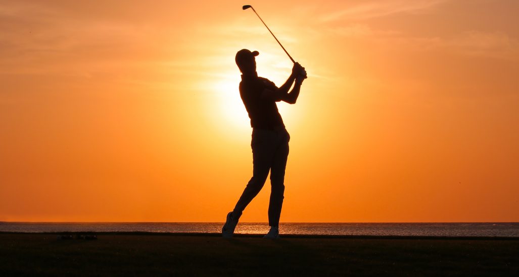 Golfer at Sunset at Royal Greens Golf & Country Club