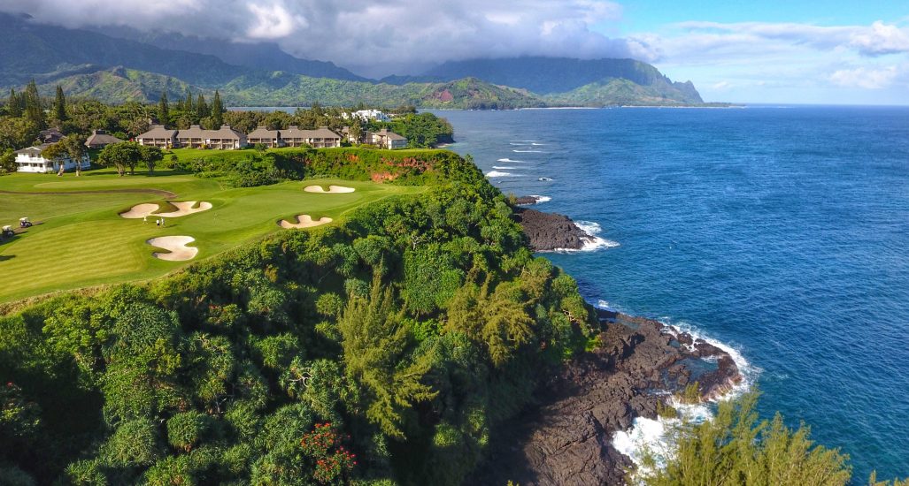 aerial shot of hole 7 of princeville makai, features of water and trees