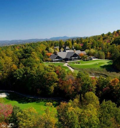 Arial view of Champion Hills with club house in background