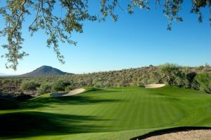 Beautiful golf course with mountain in the background. 