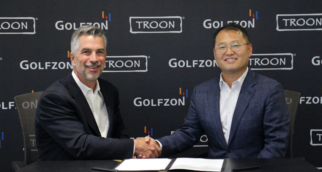 Troon president and CEO, Tim Schantz (left), with GOLFZON North America CEO, Tommy Lim.