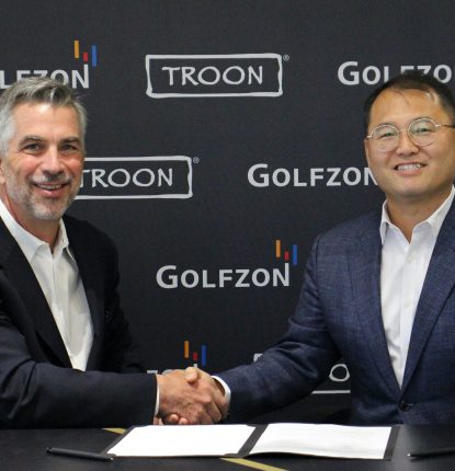 Troon president and CEO, Tim Schantz (left), with GOLFZON North America CEO, Tommy Lim.