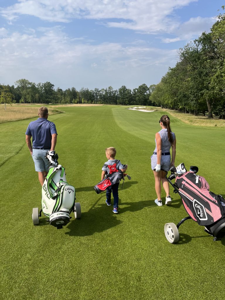 Pavel and Katerina and Olive Pokorný on the golf course at PGA National Czech Republic 