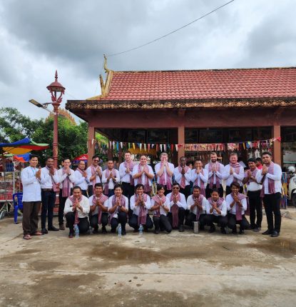 Associates from Vattanac Golf Resort at a local pagoda.