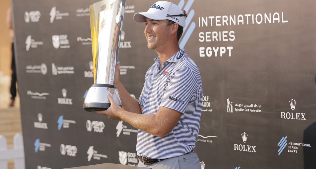 Asian Tour International Series Egypt Winner, Andy Ogletree holding the trophy