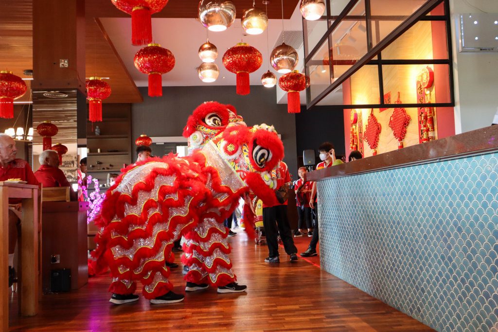 Lion dance performers in the restaurant at Els Club Desaru Coast
