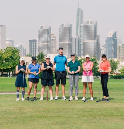 David Laing with women from tuition at Montgomerie Golf Club Dubai