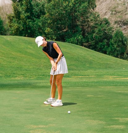 Ingrid on the golf course at Montgomerie Golf Club Dubai