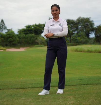 Sophea Lim standing on the golf course at Vattanac Golf Resort