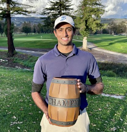 Avinash Ayer holding the Grapevine Amateur Trophy at Silverado Resort